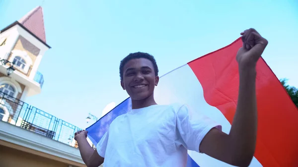 Cheerful Mixed Race Male Teen Holding France Flag Smiling National — Stock Photo, Image