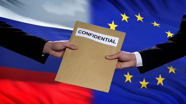 Russia European Union Officials Exchanging Confidential Envelope Flags Royalty Free Stock Images