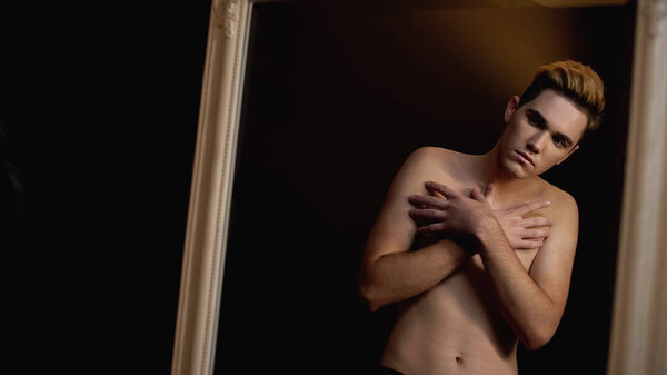 Shy Trans Man Closing Naked Torso Front Mirror Breast Surgery Stock Photo