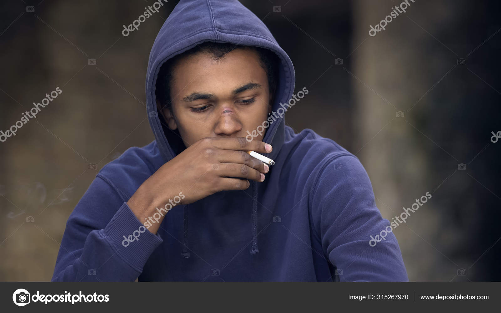 verbannen Volgen mot Afro American Teenager Smoking Outdoors Inhaling Harmful Nicotine Bad Habit  Stock Photo by ©motortion 315267970
