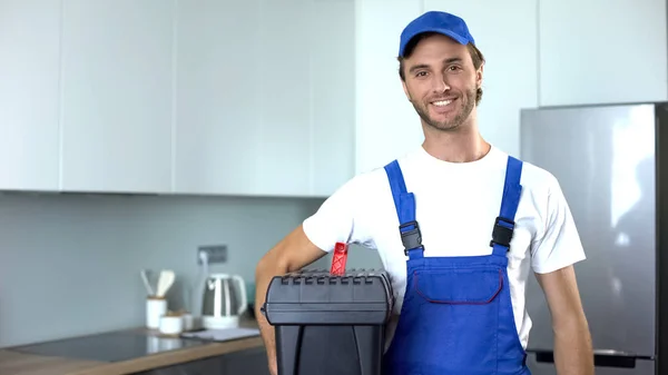 Handyman Holding Tools Standing Kitchen Professional Plumbing Services — Stock Photo, Image