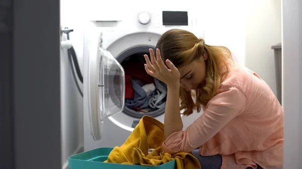 Tired Woman Loading Clothes Washing Machine Annoyed Housework Routine — Stock Photo, Image