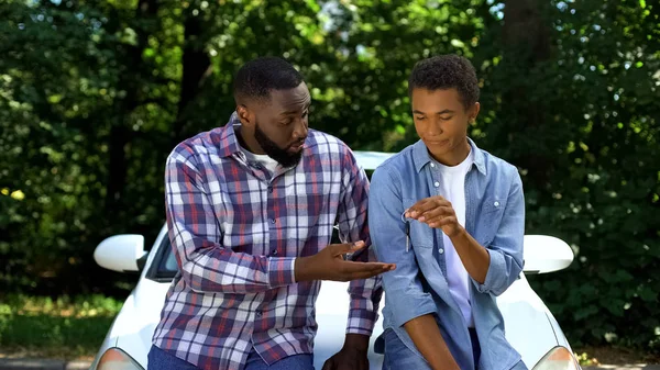 Afro American Dad Demanding Car Key Teenage Son Car Background — ストック写真