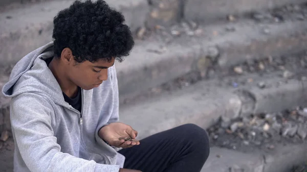 Sad Poor Teenager Looking Coins Hand Sitting Outdoors Urban Unemployment — Stock Photo, Image