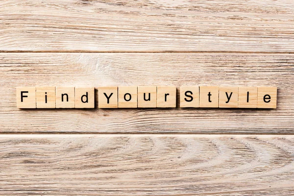 find your style word written on wood block. find your style text on table, concept.