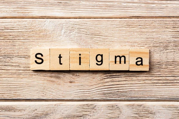 Stigma Wort Auf Holzblock Geschrieben Stigma Text Auf Dem Tisch — Stockfoto