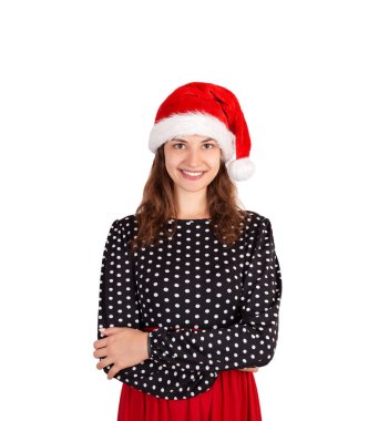 Elbiseli güzel gülümseyen kadın modeli. Noel Baba'ya duygusal kız beyaz arka plan üzerinde izole Noel şapka. tatil kavramı.