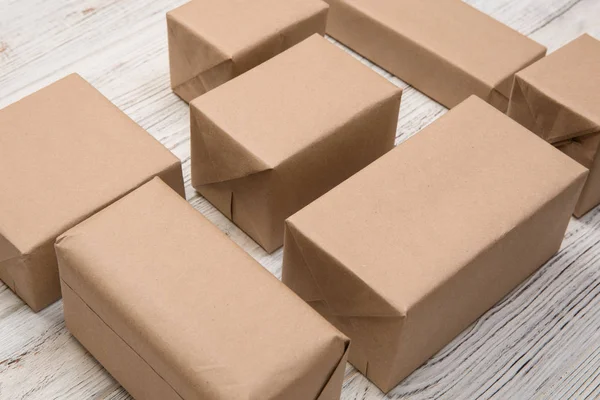 Lot Cardboard Box White Wooden Background Top View — Stock Photo, Image