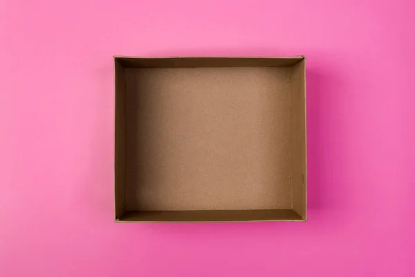 Üres Karton Papír Doboz Rózsaszín Háttér Szállítás Fogalma Felülnézet — Stock Fotó