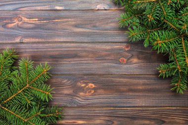 Noel gri ahşap arka plan köknar ağacı ve kopya alanı ile. üstten görünüm boş alanı tasarımınız için.