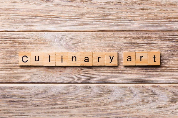 Culinary art word written on wood block. Culinary art text on wooden table for your desing, concept.