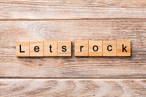 Lassen Sie Uns Rock Wort Auf Holzblock Geschrieben Lässt Text — Stockfoto