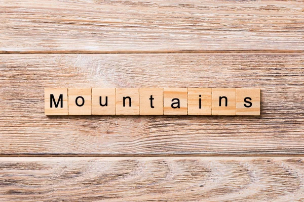 Mountains Word Written Wood Block Mountains Text Wooden Table Your — Stock Photo, Image