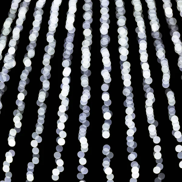 Abstrakta bokeh av vita stadens ljus på svart bakgrund. oskarp och suddig många runda ljus — Stockfoto