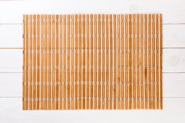 Boş Asya Gıda Arka Plan. kopya alanı düz yatıyordu ile wnit ahşap arka plan üst görünümünde kahverengi Bambu paspas