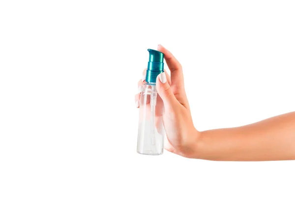 Female hand holding cream bottle of lotion isolated. Girl give tube cosmetic products on white background — Stock Photo, Image