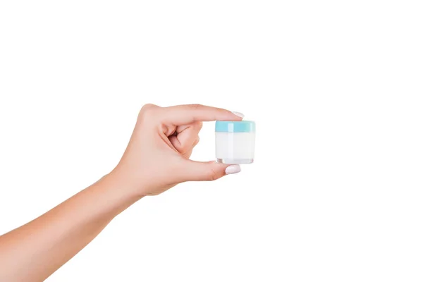 Botella de crema de mano femenina de loción aislada. Chica dar productos cosméticos tarro sobre fondo blanco — Foto de Stock