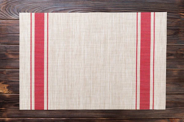 Bordsduk textil på trä bakgrund uppifrån med kopiera utrymme — Stockfoto