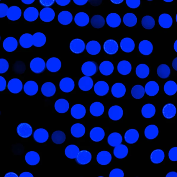 Несфокусированный темно-синий бокс на черном фоне. размыл и размыл много круглого света — стоковое фото