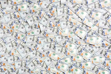 Arka plan olarak yapılmış 100 dolarlık banknotların en üst görüntüsü. Amerikan doları konsepti. Amerikan dolarlarının dokusu