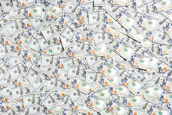 Arka plan olarak yapılmış 100 dolarlık banknotların en üst görüntüsü. Amerikan doları konsepti. Amerikan dolarlarının dokusu