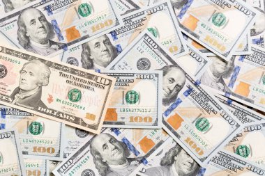 Amerikan Doları banknotları. yüz dolarlık banknotlar arka plan. Kopyalama alanı ile arka planda iş kavramının en iyi görünümü