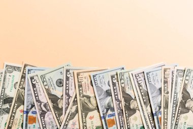 Kopya alanı ile arka planda iş kavramının karışık Us Dollar banknotpara üst görünümü arka plan