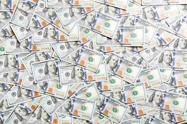 Vista superior de billetes de cien dólares hechos como fondo. USD concepto de moneda. Textura de dólares americanos —  Fotos de Stock