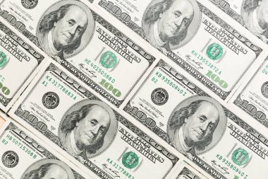Arka plan olarak 100 dolarlık banknotları kapatın. Amarican dolar desen. İş kavramına en iyi bakış