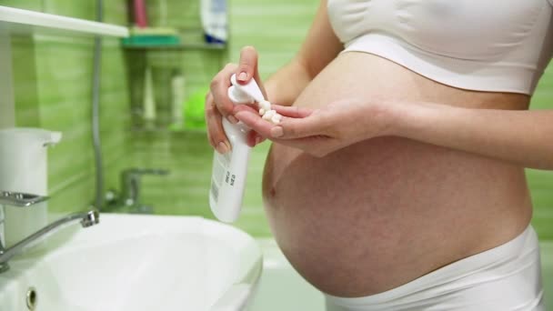 Pregnant Girl Lubricates Moisturizes Cream Stretch Marks Bathroom — Stock Video