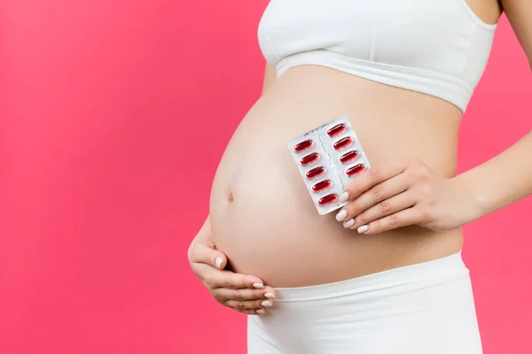 Cropped Image Pregnant Woman Holding Blister Pills Her Belly Colorful — Stock Photo, Image