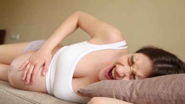 Pregnant Woman Couch Feels Pain Contractions Begin — Stock Video