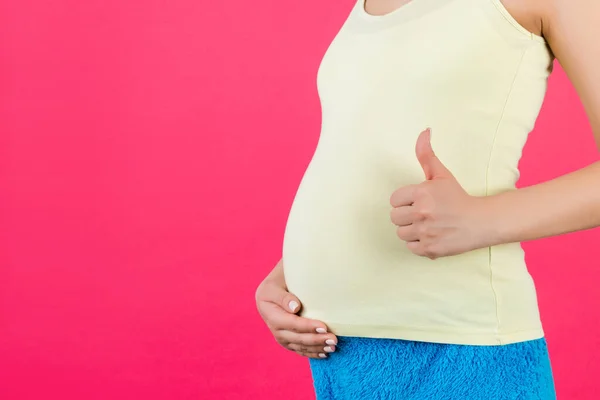 Cropped Shot Positive Pregnant Woman Colorful Home Clothing Showing Thumb — Stock Photo, Image