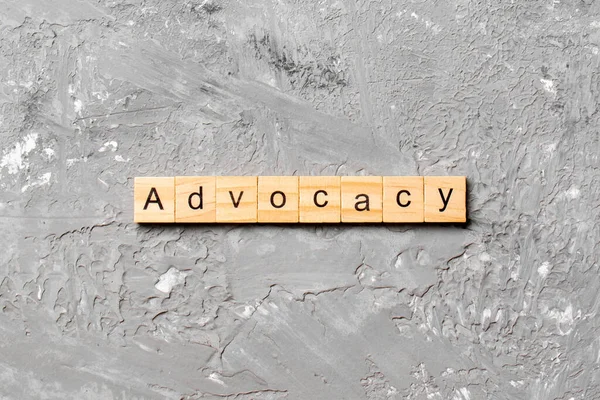 Advocacy Wort Auf Holzblock Geschrieben Advocacy Text Auf Zementtisch Für — Stockfoto