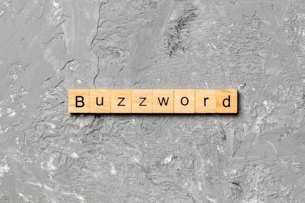 Buzzword Wort Auf Holzblock Geschrieben Buzzword Text Auf Zementtisch Für — Stockfoto