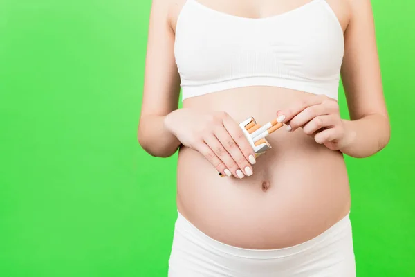 Close Pregnant Woman White Underwear Holding Pack Cigarettes Green Background — Stock Photo, Image