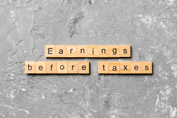 Earnings Taxes Word Written Wood Block Abbreviation Ebt Text Cement — Stock Photo, Image
