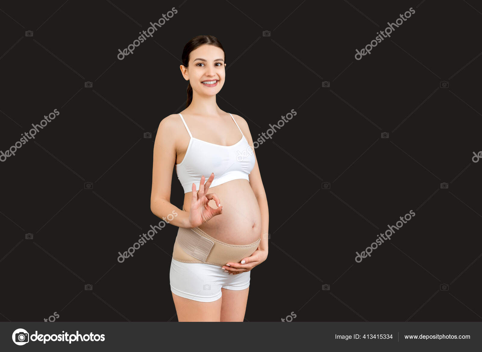 Portrait Pregnant Woman Underwear Third Trimester Wearing Pregnancy Belt  Showing Stock Photo by ©snegok1967 413415334