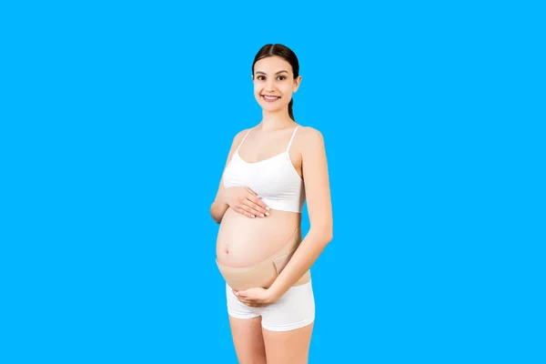 Portret Ciężarnej Kobiety Bieliźnie Ubranej Bandaż Ciążowy Celu Zmniejszenia Bólu — Zdjęcie stockowe