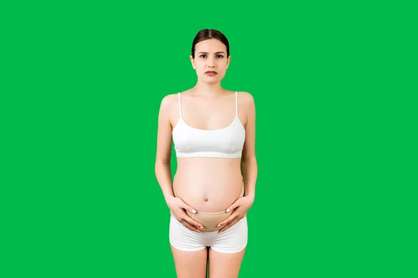 Portrait Pregnant Woman Underwear Bandage Backache Green Background Copy Space — Stock Photo, Image