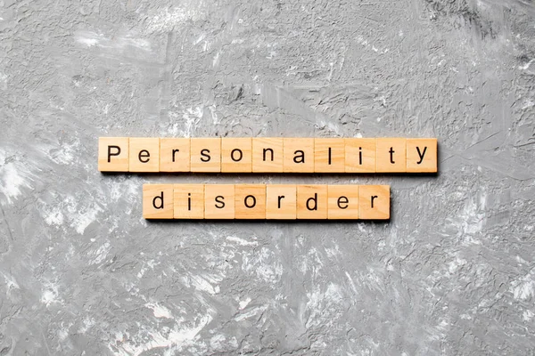 Personality disorder word written on wood block. Personality disorder text on table, concept.