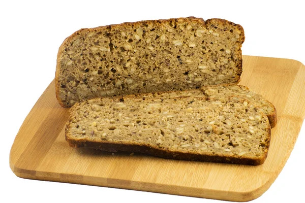 Kesme Tahtasında Dilimlenmiş Çavdar Ekmeği Tohumlu Tam Tahıllı Çavdar Ekmeği — Stok fotoğraf