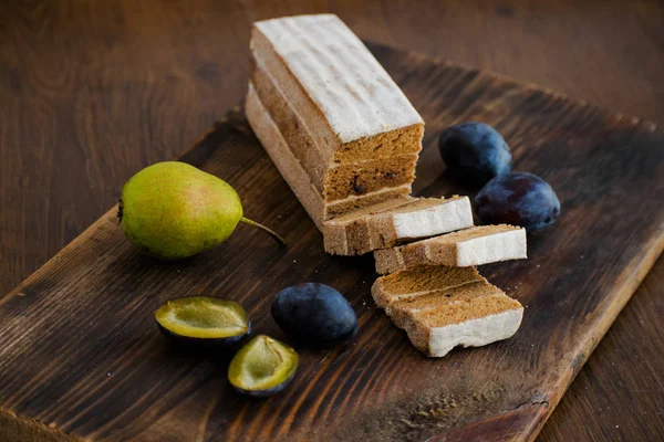 Fruit leather of plums and pears. Russian pastila. Fruit plum strudel cake.