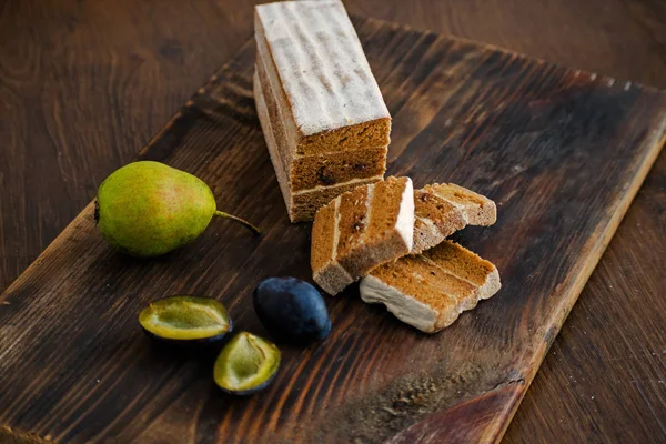 Fruit leather of plums and pears. Russian pastila. Fruit plum strudel cake.