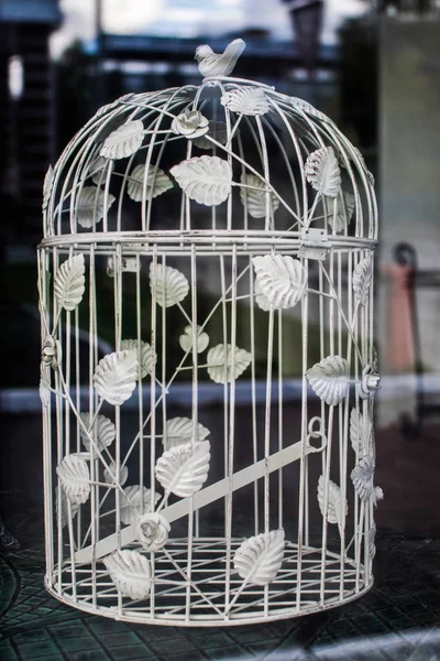 Bird cage. Wedding decorations. Decorative candlestick.