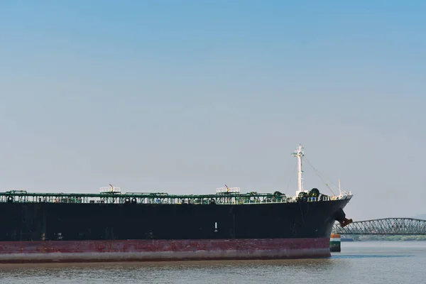 Deck of a merchant ship standing in a port