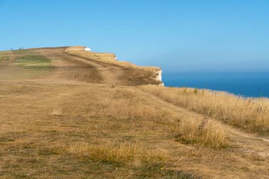 Beachey kafa, Sussex/Uk - 23 Temmuz: Nerede Güney bana Beachy Head East Sussex'deki / daki denizde 23 Temmuz 2018 üzerinde çıkışlar. Kimliği belirsiz kişi