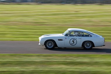 Goodwood, West Sussex'deki / / Uk - Eylül 14: 14 Eylül 2012 tarihinde yarış Goodwood at Goodwood Vintage. Bir Tanımlanamayan kişi