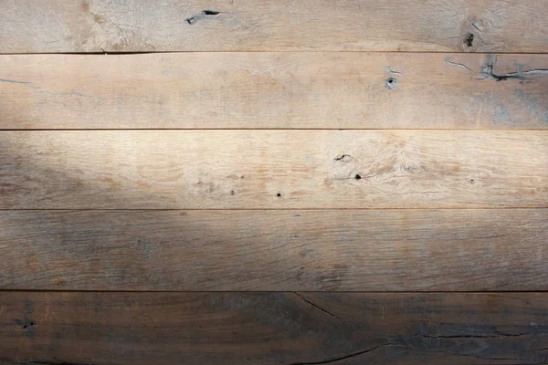 Eine Holzoberfläche Auf Die Ein Lichtstrahl Fällt — Stockfoto