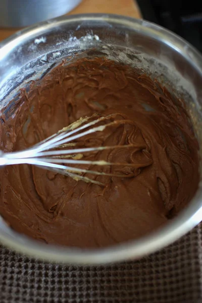 Cooking a cupcake at home in the kitchen